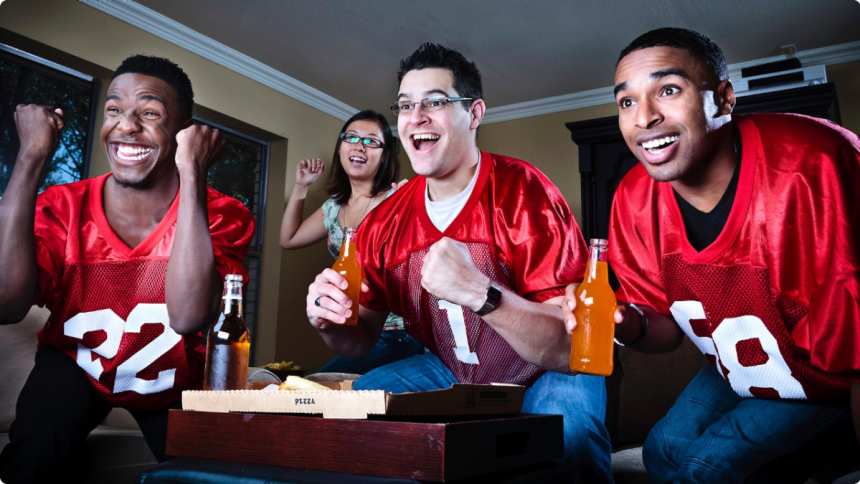 Sports fans watching a game together